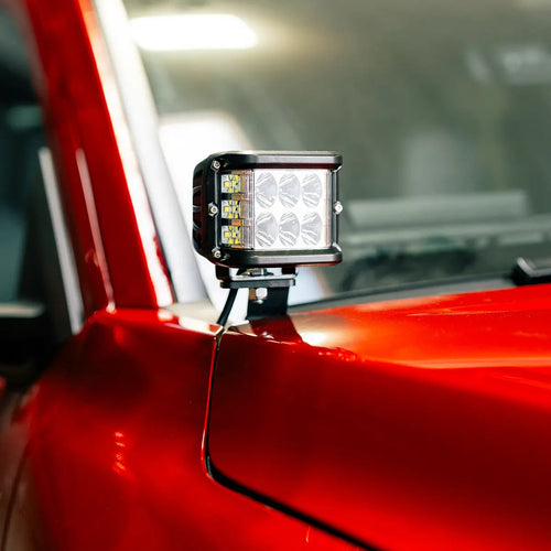LED ditch lights mounted on the hood of a 2024 Toyota Tacoma