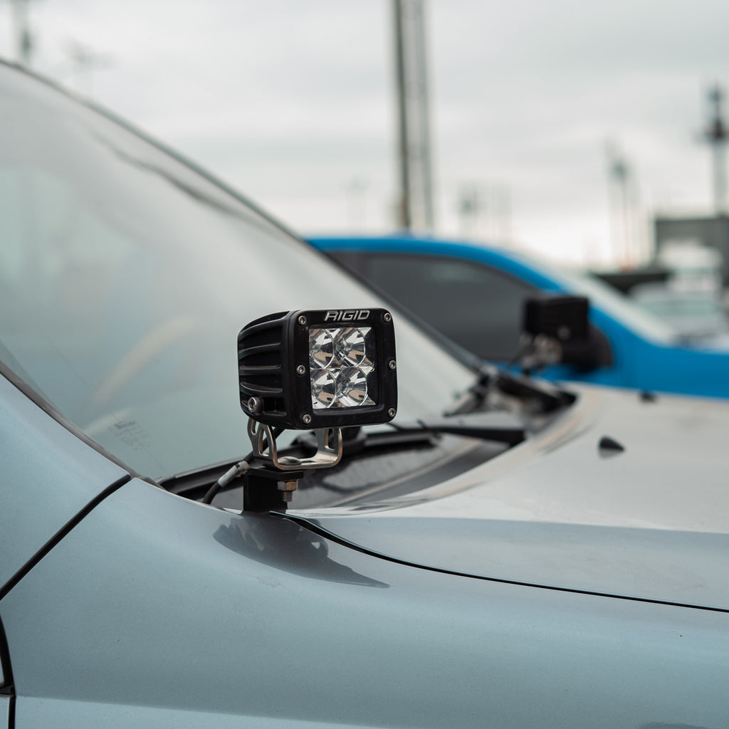 RIGID pod mounted on a Cali Raised LED Lexus GX470 ditch light bracket, with the opposite mount visible