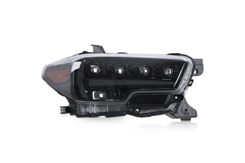 Attica Apex Series Tacoma headlight front view showing bi-LED projectors and smoked DRL bar