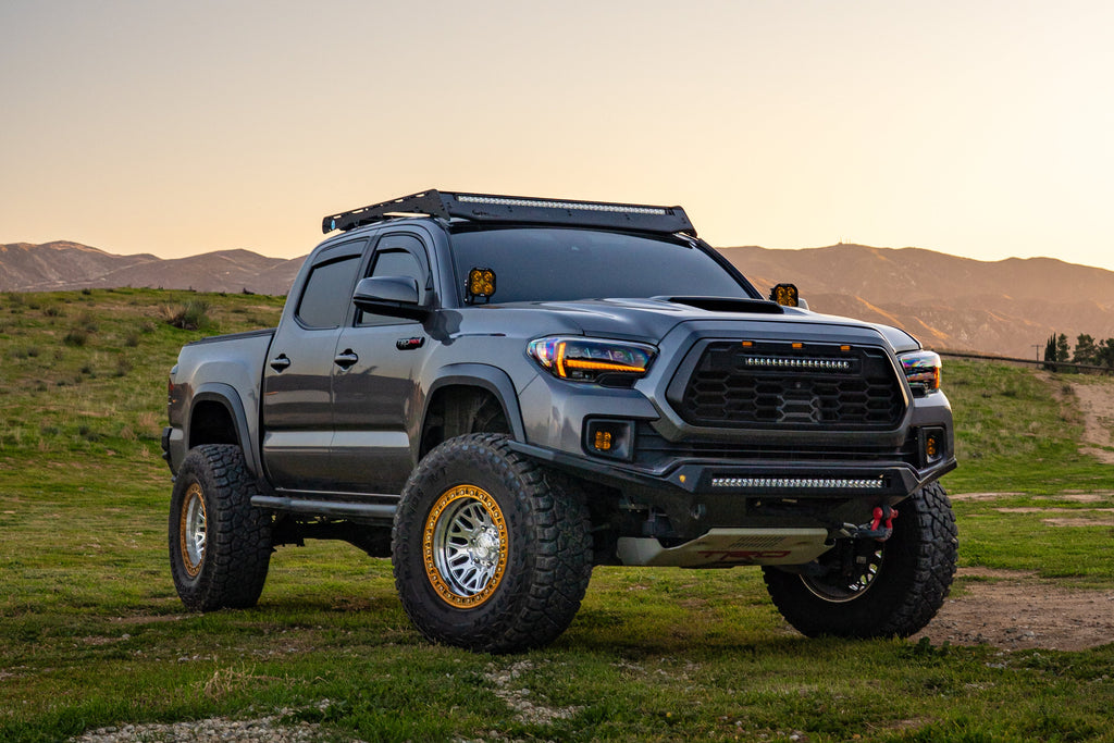 2016-2023 Toyota Tacoma with Attica 4x4 Apex Series headlights installed, front three-quarter view