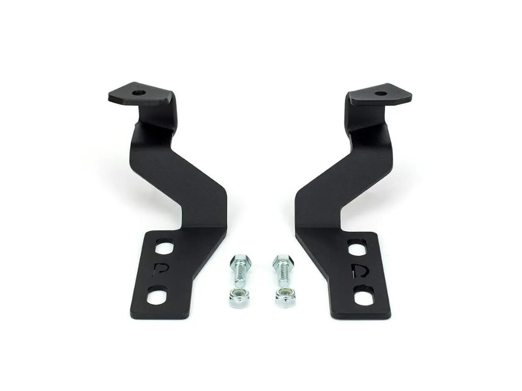 Pair of black Cali Raised LED low profile ditch light brackets for 2003–2009 Lexus GX470 with mounting hardware on a white background