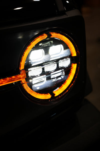 Attica Apex Series headlight on a Ford Bronco with amber DRL lit