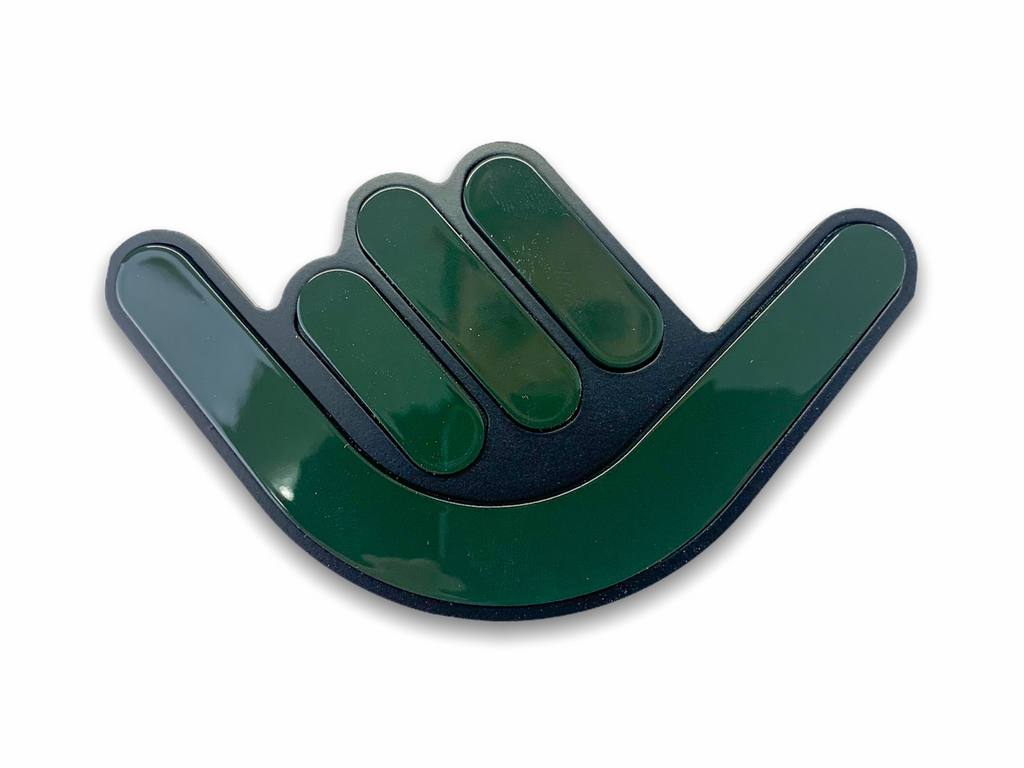 Shaka Grille Badge