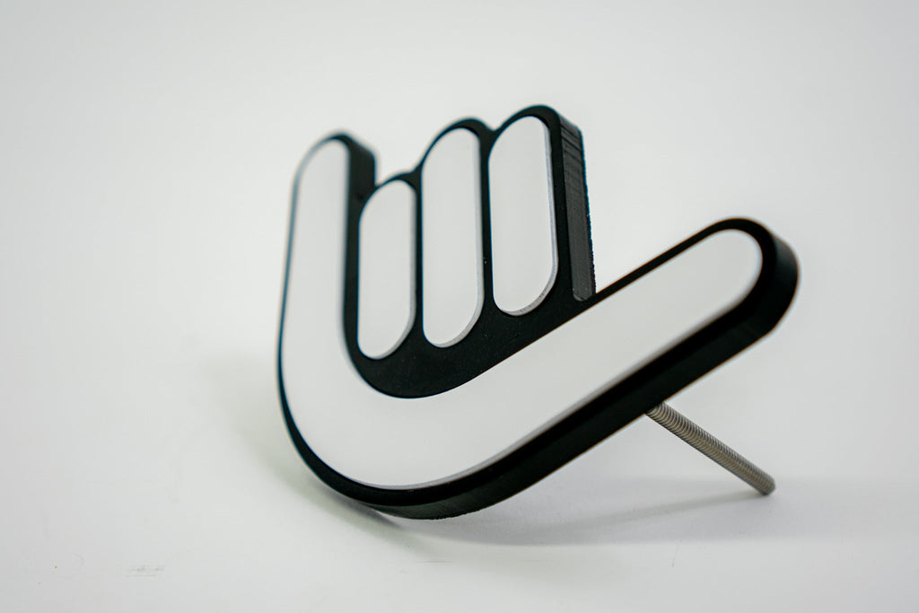Shaka Grille Badge
