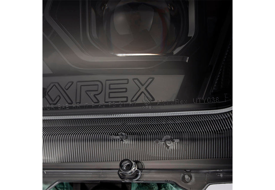 LUXX-Series Projector Headlights Alpha-Black Fits 10-13 Toyota 4Runner